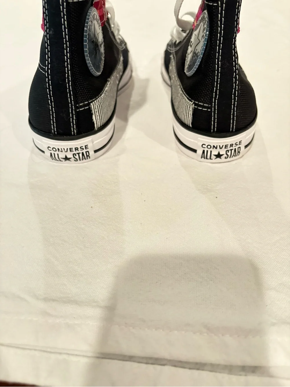 Converse Black High-Top Sneakers with Red Plaid Accent